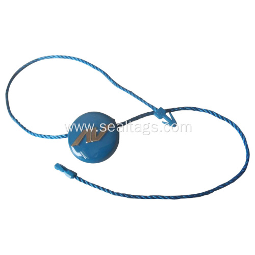 Blue round plastic tag with black bead